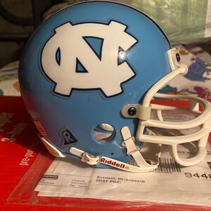 North Carolina Tar Heels mini Riddell Blue Football Helmet.